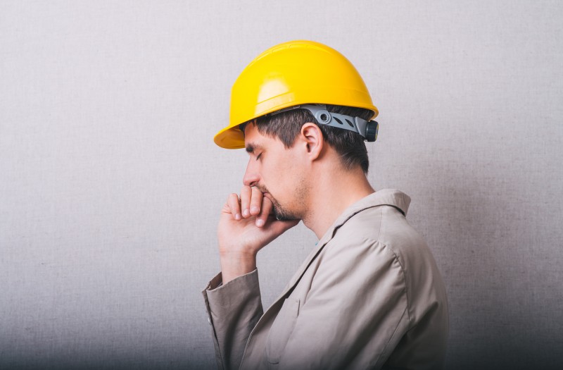 Worker uk. Man in a Construction Helmet. Construction Boss.