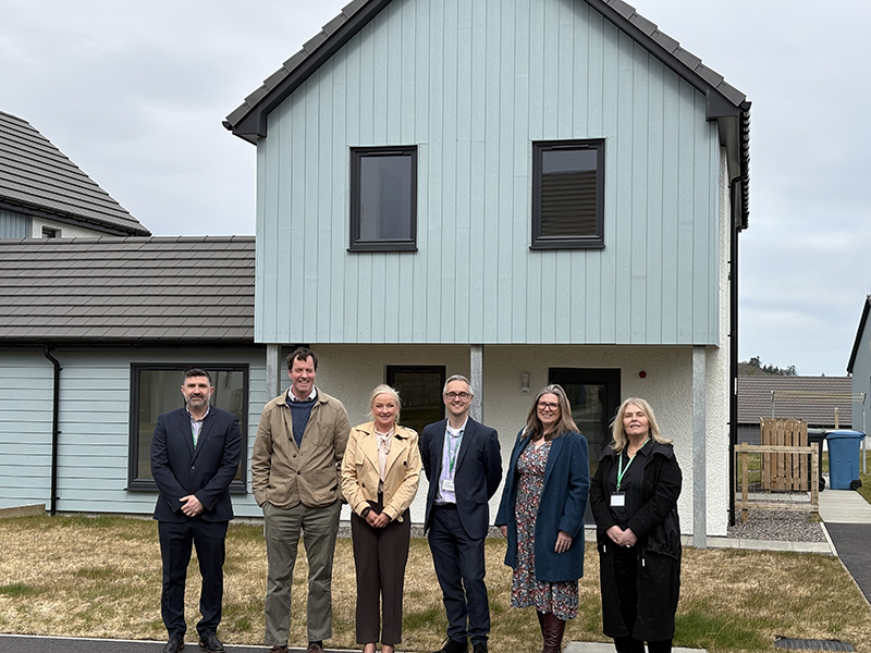 Albyn senior leadership and Angus MacDonald MP visit one of the homes in Broadford, Isle of Skye