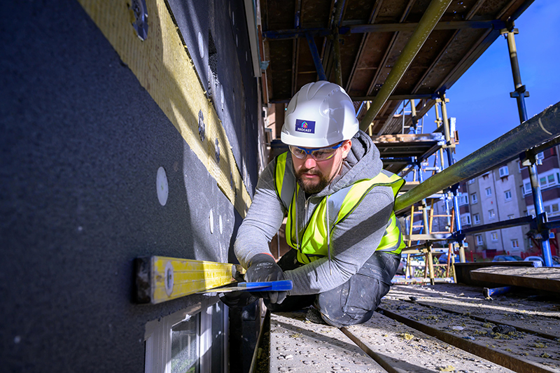 Construction worker carrying out retrofit work